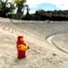 Brick astronaut with camera in the Kalimarmaro, where the first Olympic Games were held.