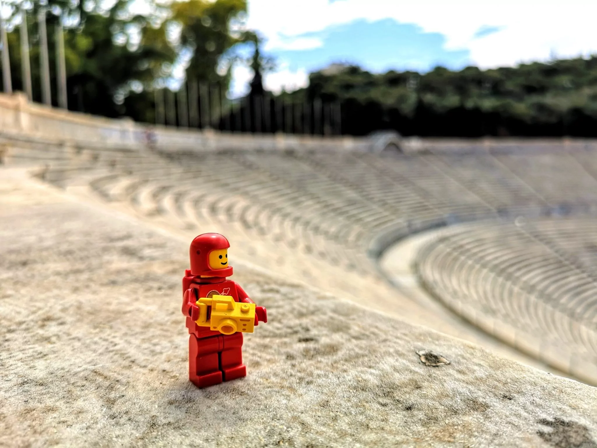 Brick astronaut with camera in the Kalimarmaro, where the first Olympic Games were held.